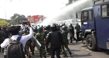 

Tension escalated in Pettah, Colombo as police confronted a group of demonstrators with tear gas and water cannons. 

The protest, orchestrated by the 'Jana Aragala Viyaparaya' (People’s Struggle Movement), centered on a myriad of grievances including the skyrocketing cost of living and contentious foreign agreements.

