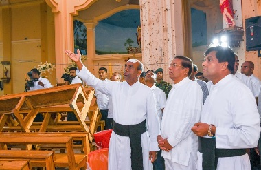 
President Maithripala Sirisena this morning visited St Sebestian’s Church in Katuwapitiya where at least 62 people died in the bomb attack on Easter Sunday.

He condoled with the Parish Priest Rev Shrilal Fonseka and also inquired after the reconstruction of the Church which is badly damaged.
