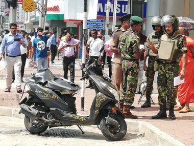 
The Special Task Force (STF) personnel carried out a controlled explosion to open up the seat of a suspicious motorbike near the Savoy Cinema at Wellawatta this morning, Police Spokesman Ruwan Gunasekara said.

The STF personnel had first inspected the bike and had decided to blow open the seat having failed to open it in the first place.

However, the spokesman said no explosives were found inside the bike.

